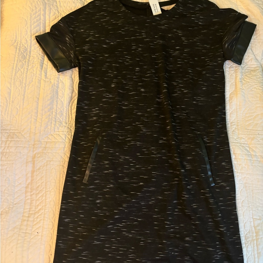 Black striated shift dress with faux leather detailing